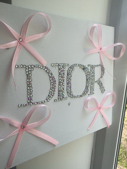 “DIOR” rhinestone canvas art with ribbons